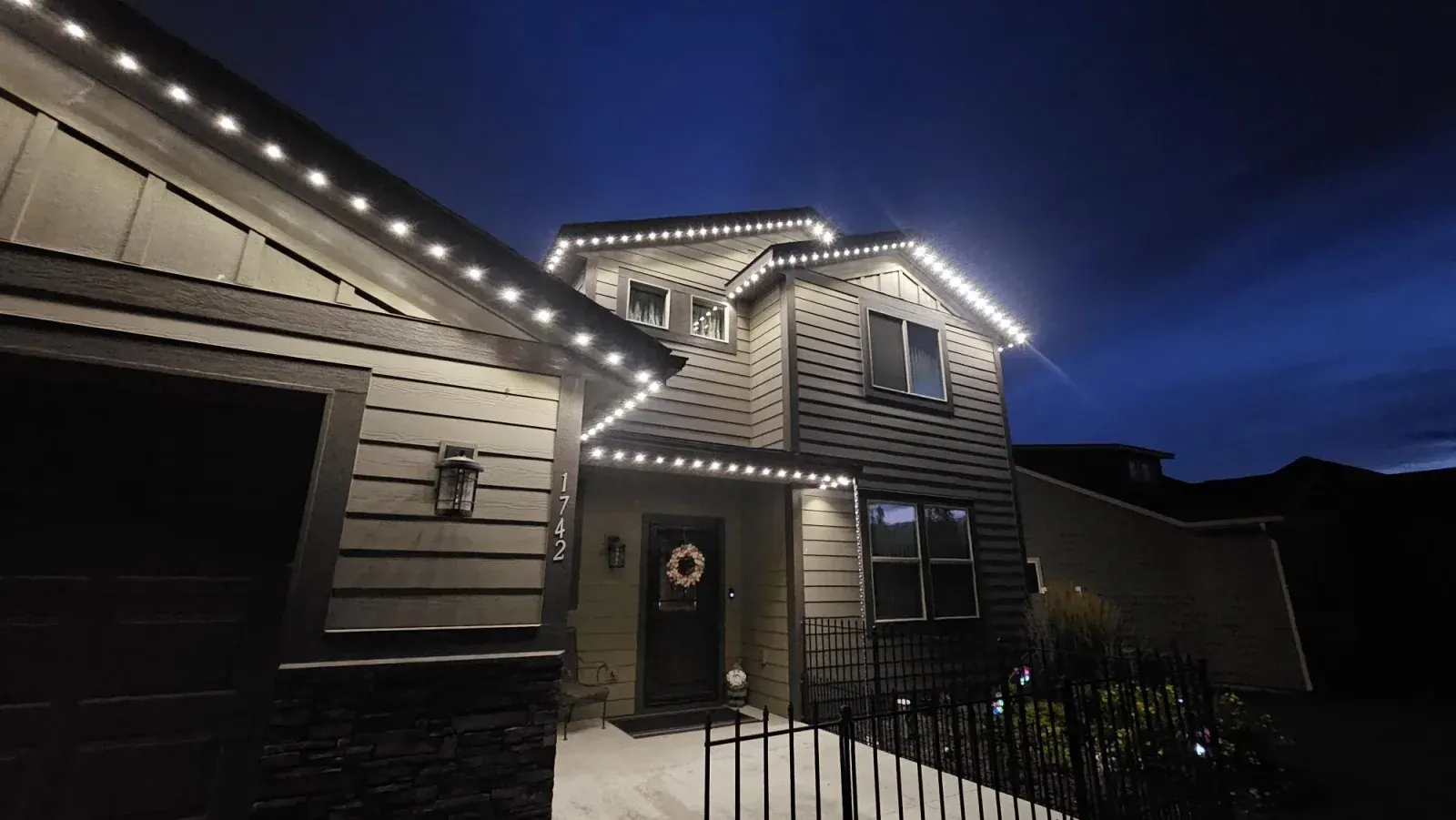 Permanent LED roofline lighting on a home in Mount Brydges, Ontario by Forever Lights